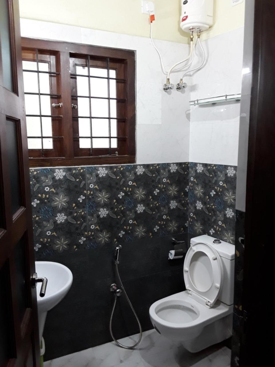 Moksha Homestay Тривандрум Экстерьер фото
